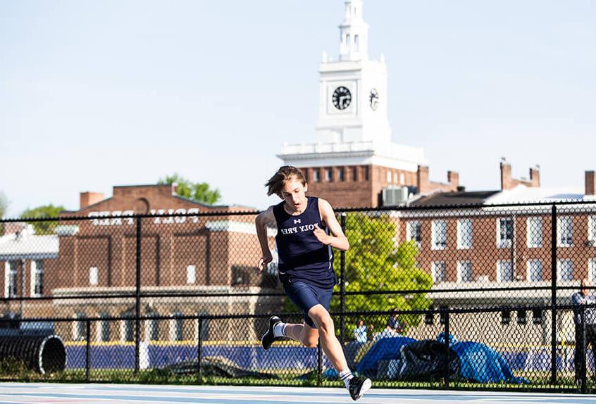 Track and field boy running